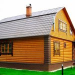 деревянный дом из облицовочного бревна