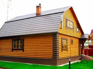 деревянный дом из облицовочного бревна