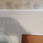 L-shaped countertop made of artificial stone